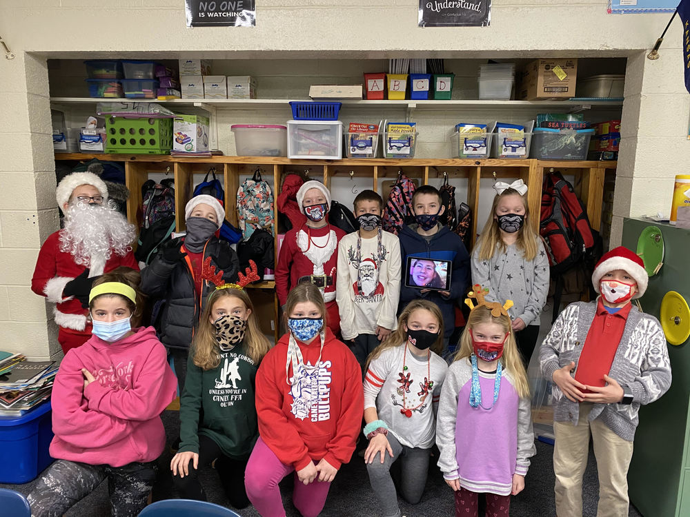 Students dressed up for North Pole Days with Santa, Elf and Reindeer costumes